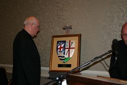 Priests offer Bishop Niederauer a fond farewell