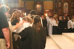 Choir school students celebrate the Rite of Investiture