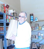 Holy Family parishioners share their time to bring food to those in emergency situations