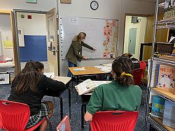 Our Lady of Lourdes School volunteer sharpens the math minds of middle-school students
