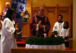 Bishop John C. Wester blesses the Advent wreath on the First Sunday of Advent