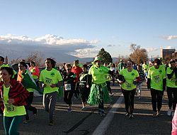 Runners and walkers of all ages celebrate the 25th Annual Leprechaun Lope to benefit Our Lady of Lourdes School