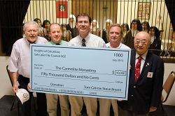 Carmelites receive donation from Knights of Columbus to help with monastery's restoration
